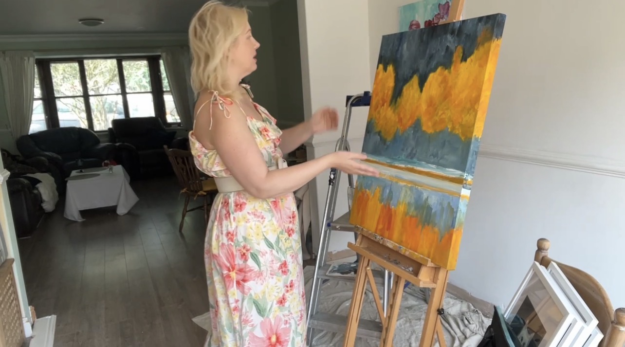 Marina Stognieva beside Golden Autumn. The Shadow That Seeks the Light in her studio, England, 2025